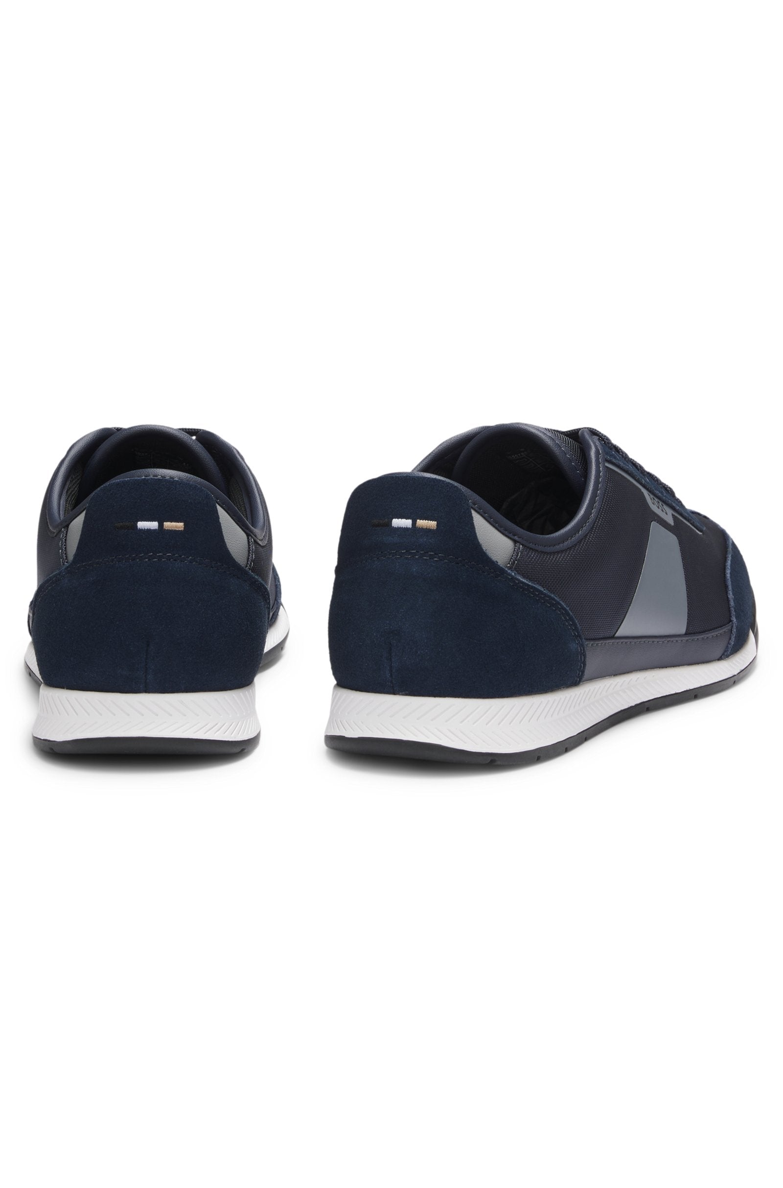 Low-top trainers with structured trims