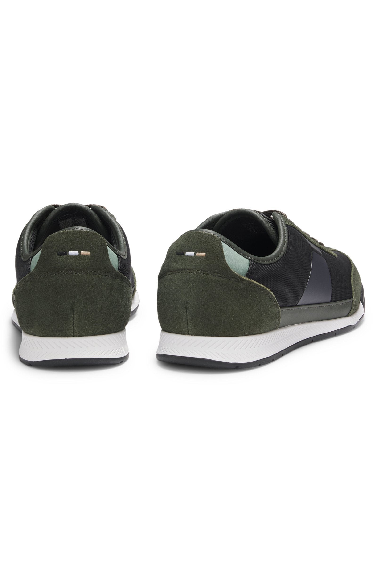Low-top trainers with structured trims
