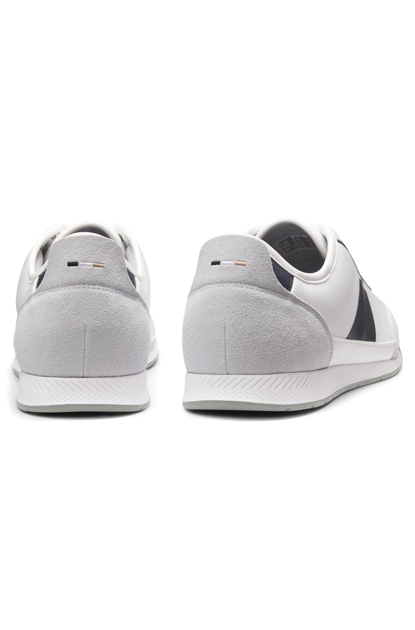 Low-top trainers with structured trims