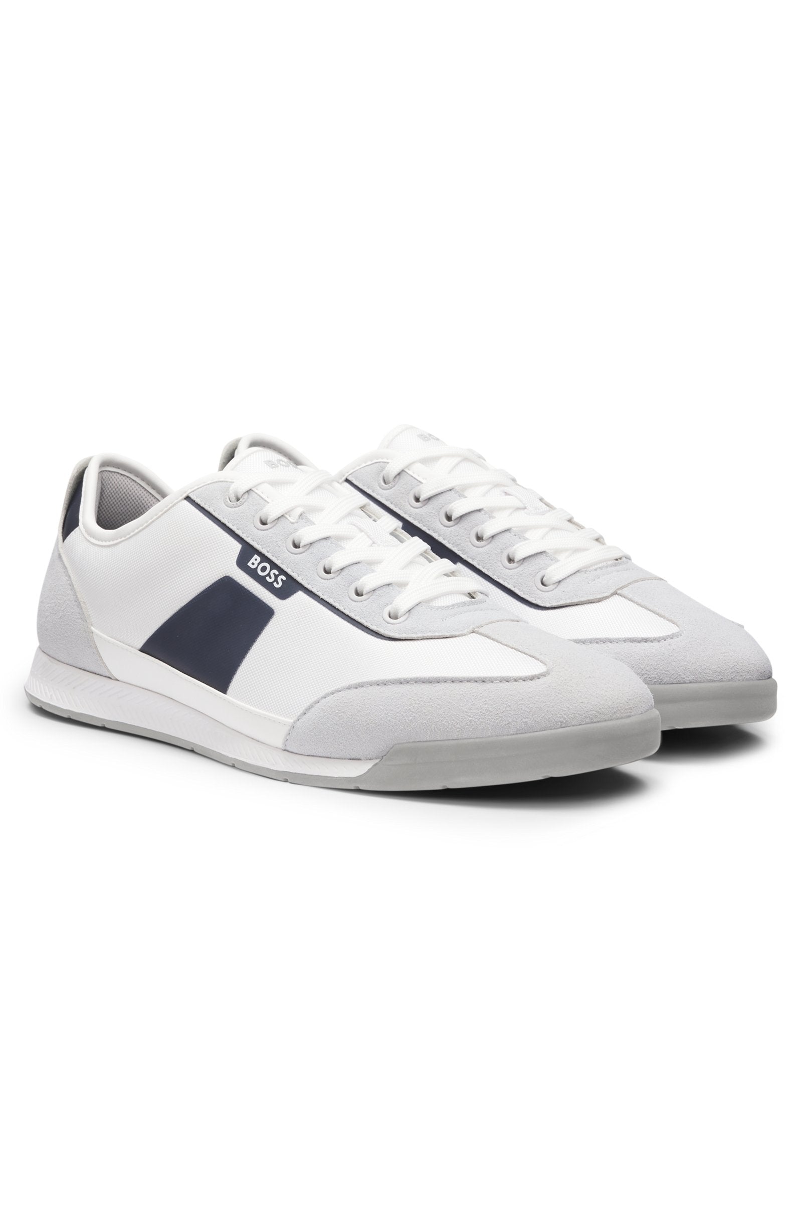 Low-top trainers with structured trims